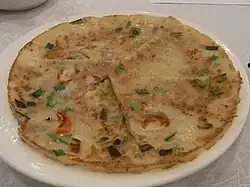 Chinese glutinous rice pancake or "Chinese pizza"