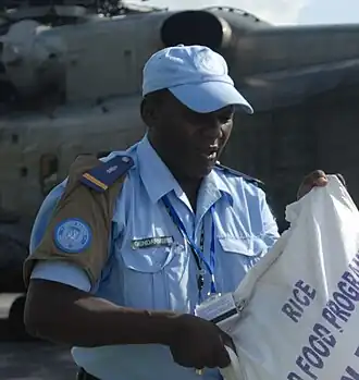 A Haitian policeman with a United Nations brassard, 2008.