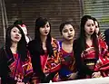 Hajong girls in traditional clothing.