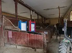 Former stables with standing stalls