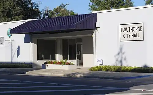 One-story white building