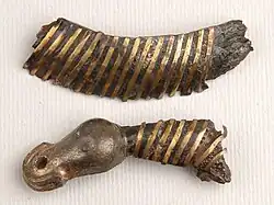 Dragon head on the Hellvi helmet eyebrow (550–600)