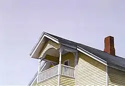 oil painting of partial upward view of balcony of yellow house with red chimney and pale blue sky