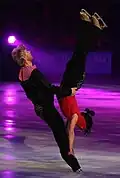 The male skater performs an outside spread eagle (Isabelle Delobel & Olivier Schoenfelder)