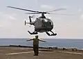 Indonesian Navy Bo. 105 lands on USS Inchon in 2001.