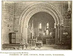 Interior showing the very fine Norman chancel arch, photographed ca. 1890