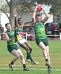 Irish player takes an overhead mark