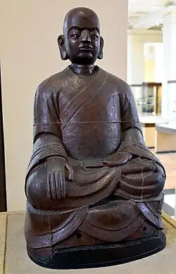Iron figure of a luohan, from China, Ming dynasty, 1494 CE, the British Museum