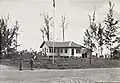 A native boy on police duty in the 20th Infantry Brigade area.