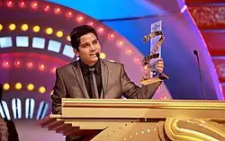 Kamal Khan at Zee Cine Awards 2012, receiving "Fresh Singing Talent" 2012 Award.