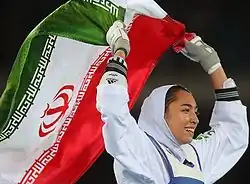Lap of Honor of Kimia Alizade during 2016 Summer Olympics with the Islamic Republic tricolour flag of Iran