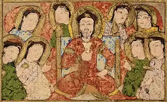 Kitâb al-Diryâq, folio 24 (royal court detail, ruler in Turkic dress, wearing the sharbush hat).[3]