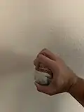 Knuckleball grip (side)