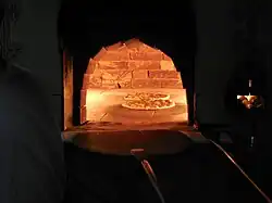 Image 15Kuboos (flatbread) being prepared in Abu Dhabi (from Emirati cuisine)