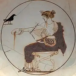 Apollo, holding a kithara, beside a black bird