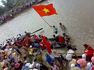 Boating festival to pray for rain in Đoàn Lập commune, August 30, 2009.