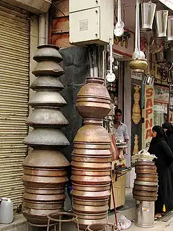 Copper household utensils shop in Laad Bazaar