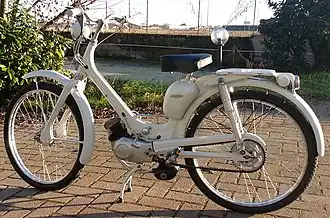 White single seat moped, a light motorcycle with pedals