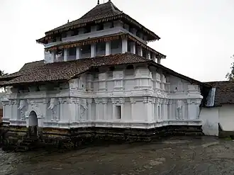 The Lankatilaka Vihara, a 14th-century building influenced by Dravidian architecture, designed and involving an architect and craftsmen from South India.