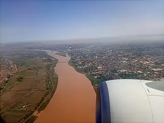 Niamey as seen from an aeroplane, centered on a river