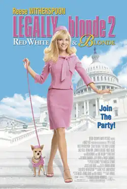 A woman in a pink suit and hat, with a small dog also dressed in pink, standing on the steps of the Capitol building.