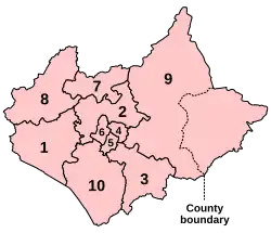 A map of a large county and an adjacent small county, to the east. The two counties are divided into a total of ten constituencies