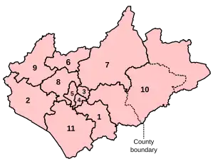 A map of a large county and an adjacent small county, to the east. The two counties are divided into a total of ten constituencies