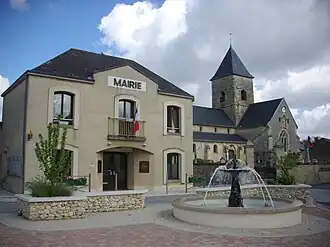 The town hall and church in Les Mesneux