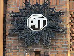 Logo of the French PTT on a former post office in Lille