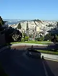 Looking east down the curvy block of Lombard Street, with the straight section continuing towards Telegraph Hill and Coit Tower