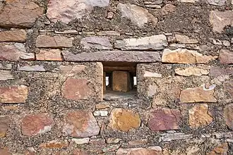 Loophole in outer wall for firearms