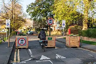 A trial modal filter using easily moved planters in London.