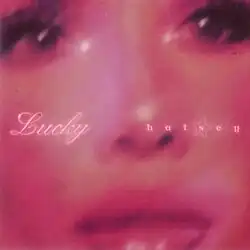 A blurry close-up of Halsey's face with sparkles and her name and song title written in the middle