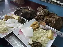 Luwombo served with rice and posho