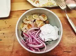 Lychee salad, coconut cream, pork sausage