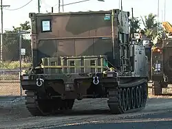 Colour photo of a tracked military vehicle