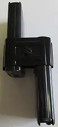 Two 15-round M1 Carbine magazines attached by a clip.