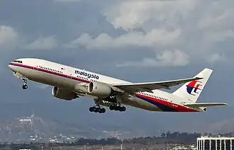9M-MRO, a Malaysia Airlines B777-200ER livery just after lifting off the runway