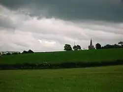 The MacRae of Orangefield Memorial above the Dutch Barn Caravan Park.