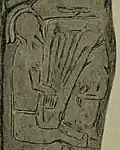 11th century A.D., Isle of Man. Lyre player. Manx runestones, the Mal Lumkun Cross, (also known as the Br Olsen;215 (Kirk Michael (III), MM 130). Asymmetrical lyre.