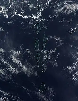 NASA satellite image of some of the atolls of the Maldives, which consists of 1,322 islands arranged into 26 atolls