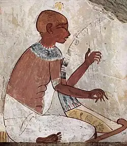 Blind harper in Tomb of Nakht, TT52, 1422-1411 BCE. Ladel-shaped