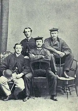 group photo of four young students in casual pose