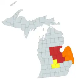 Mid Michigan Counties highlighted in red, with the Lansing area in yellow, and The Thumb in Orange