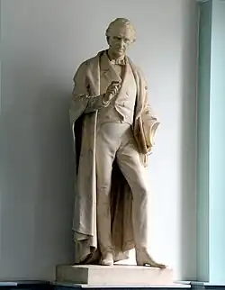 Marble statue of Sir Henry Marsh, former president of the College, the Graves hall at No.6 Kildare Street[14]