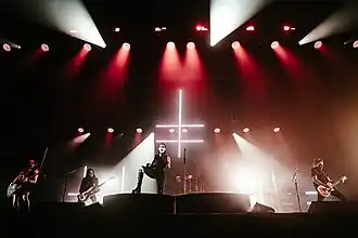 Marilyn Manson performing in 2024. From left to right: Reba Meyers, Piggy D., Marilyn Manson, Gil Sharone (background) and Tyler Bates
