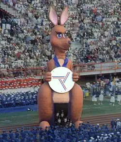 A large sculpture of a kangaroo on a racetrack