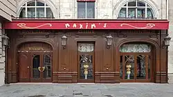 Ground floor wooden Art Deco façade, with the inscription "Maxim's'