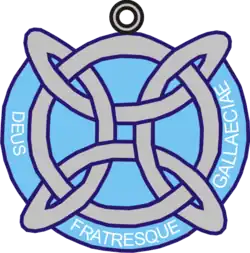 A bronze bust of Mark Twain on a pedestal