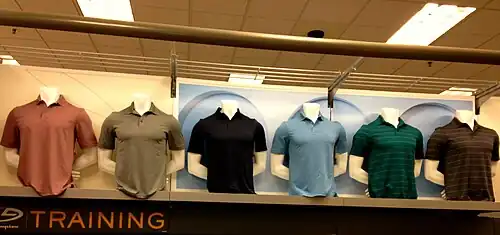 Men's polo shirts in more muted earth tones, 2015, reflecting the shift from neon and bright colors toward minimal, mature palettes.